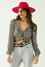 Load image into Gallery viewer, Striped Crop Top With V-Neckline and Twisted Front in Black and White.
